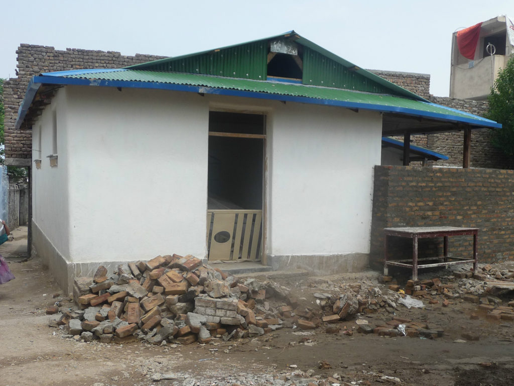 Saleem house lime plaster is applied